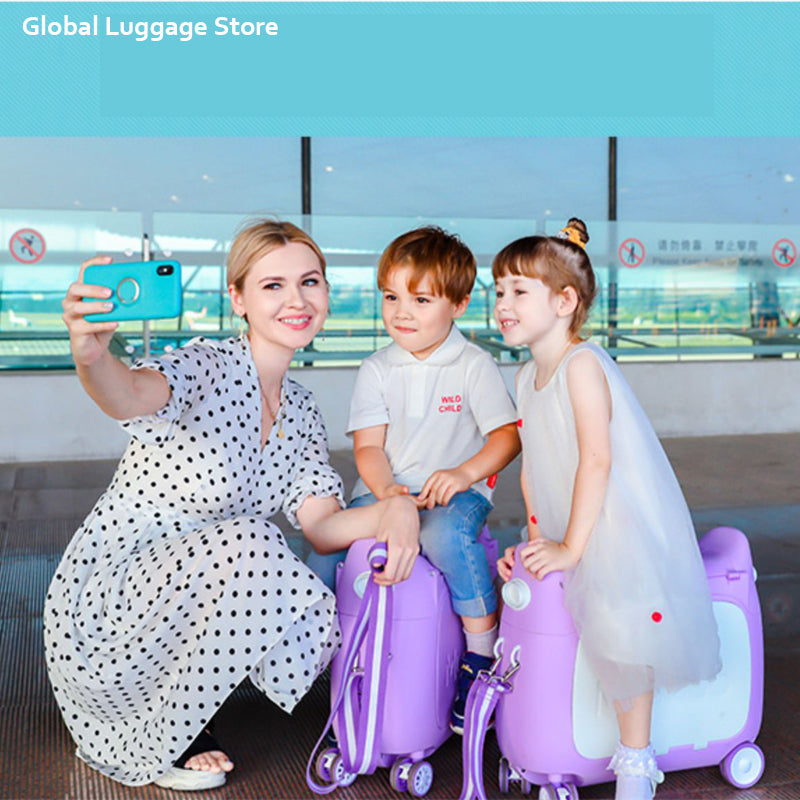 Woman taking a selfie with two children on purple luggage at an airport.