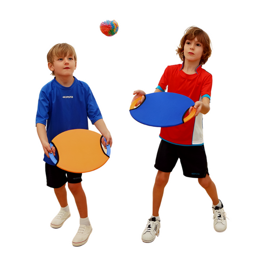 Two children playing with colorful disc toys on a white background